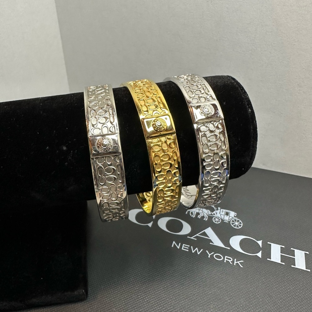 Set of Coach Silver and Gold Textured Bangle Bracelets - Picture 2 of 6